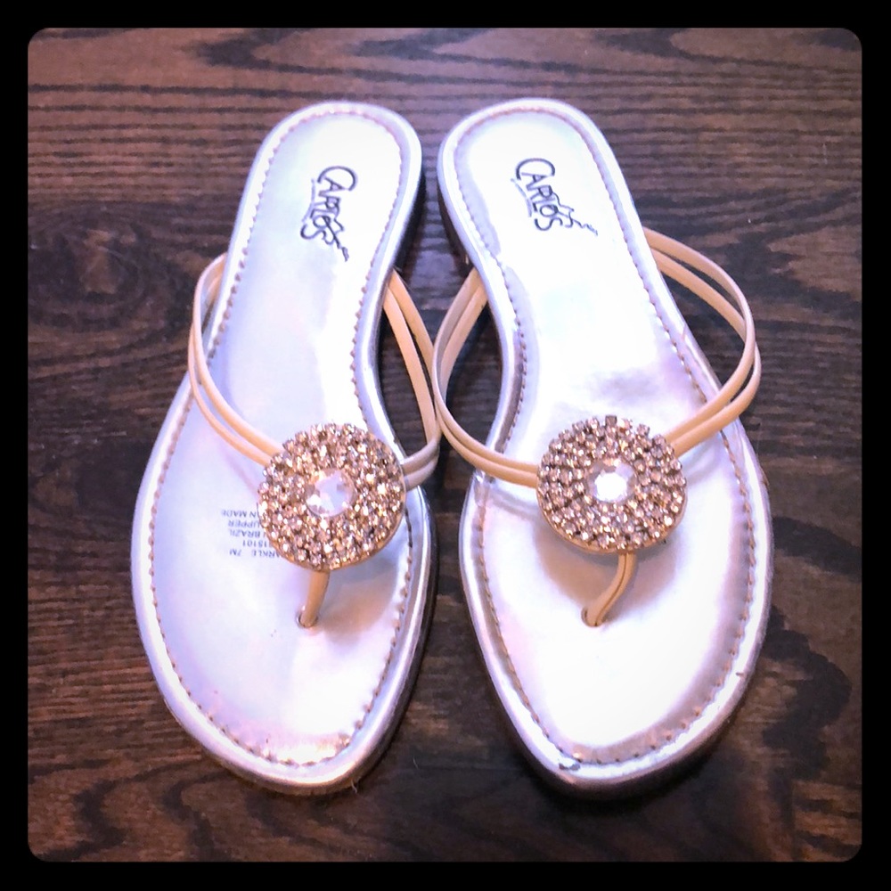 Carlos Santana silver flip flops